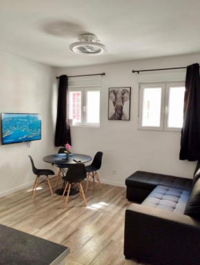 Apartamento blanco y negro en el centro